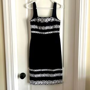 White House Black Market Black cocktail dress with silver embroidery. Size 2.